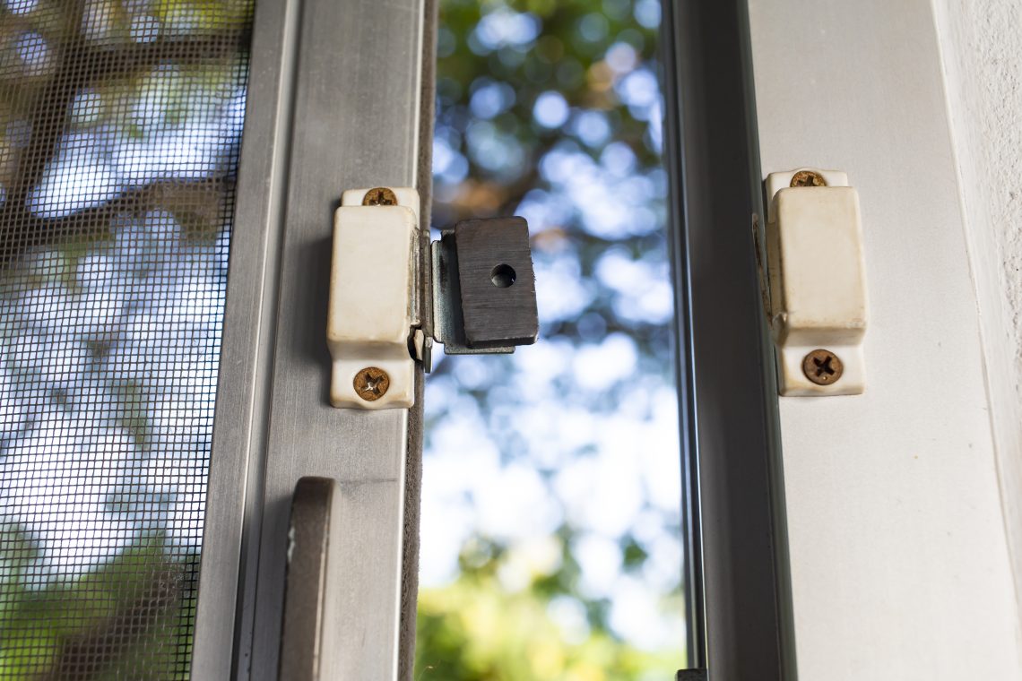 Broken security magnetic lock  contact for mosquito wire screen window, Repair Room concept