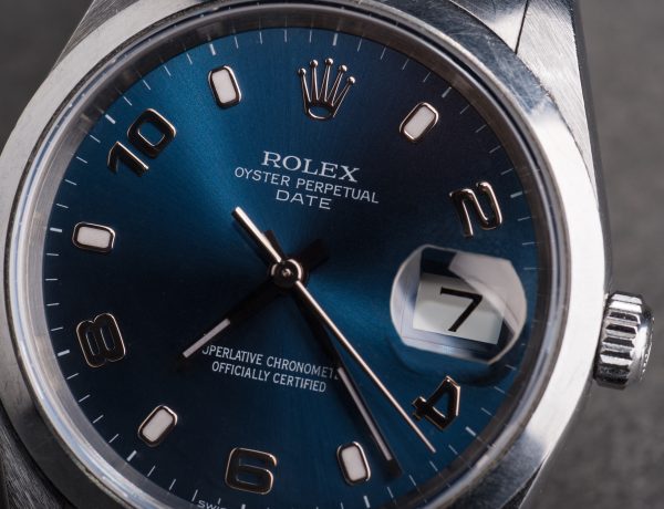 BOLOGNA, ITALY - MARCH 5, 2018: Rolex Oyster Perpetual Date watch. Rolex SA is a Swiss luxury watchmaker, founded by Hans Wilsdorf and Alfred Davis in London, England in 1905. Illustrative editorial.