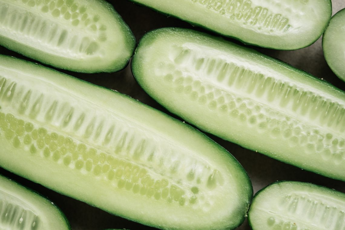 Green and white sliced cucumbers