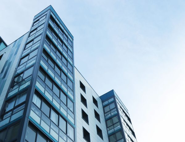 Low angle view of office building against sky