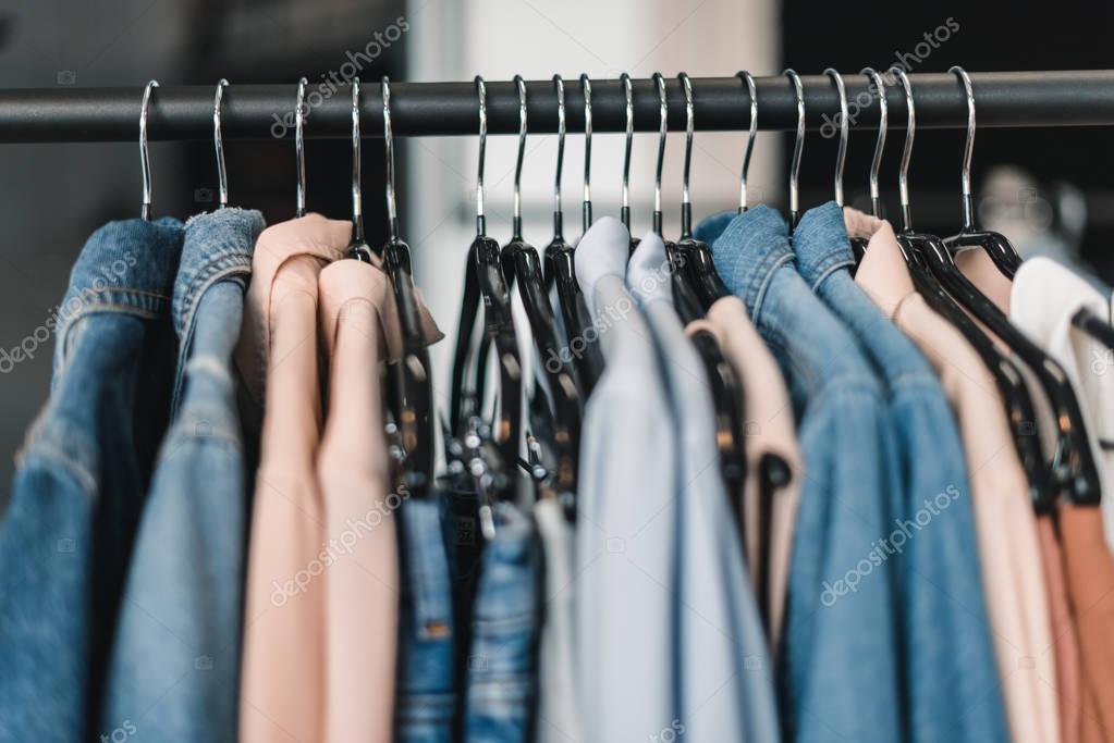 stylish clothes on hangers