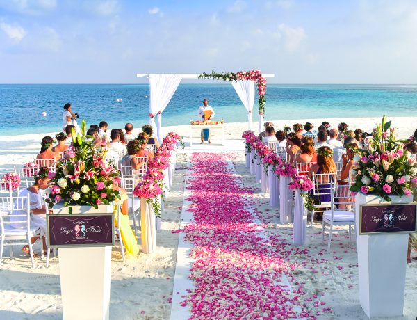 Beach wedding ceremony during daytime