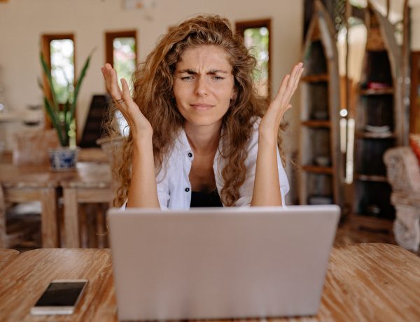 Photo of woman showing frustrations on her face