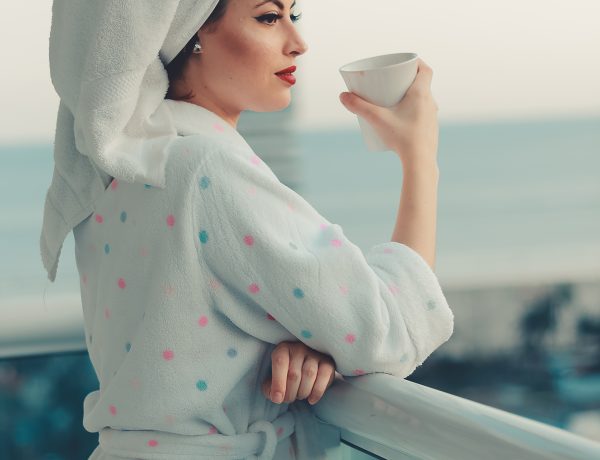 Photo of woman wearing bathrobe