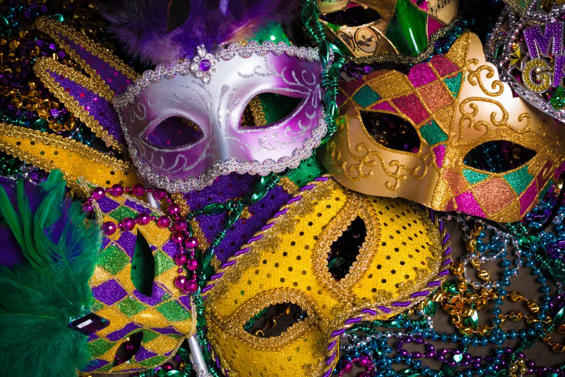 Wearing Mardi Gras Masks