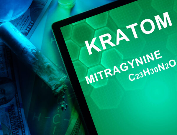 Tablet with the chemical formula of Kratom (Mitragyna speciosa) Mitragynine.
