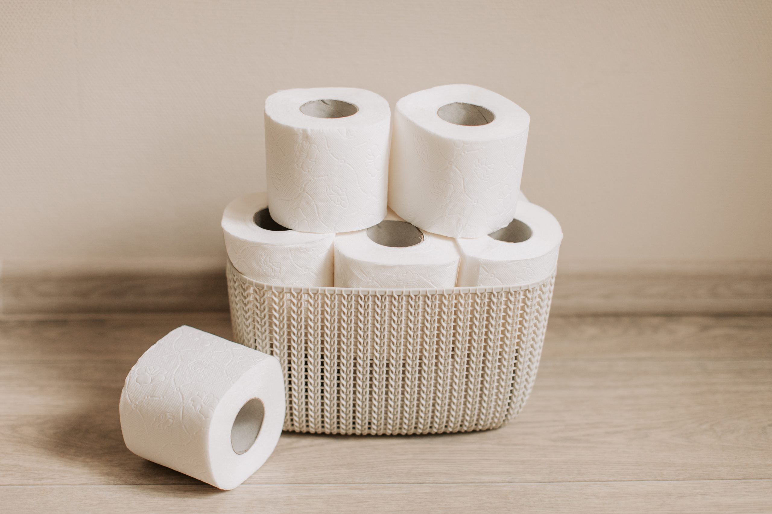 Toilet paper rolls on basket