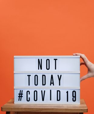 Not today covid19 sign on wooden stool