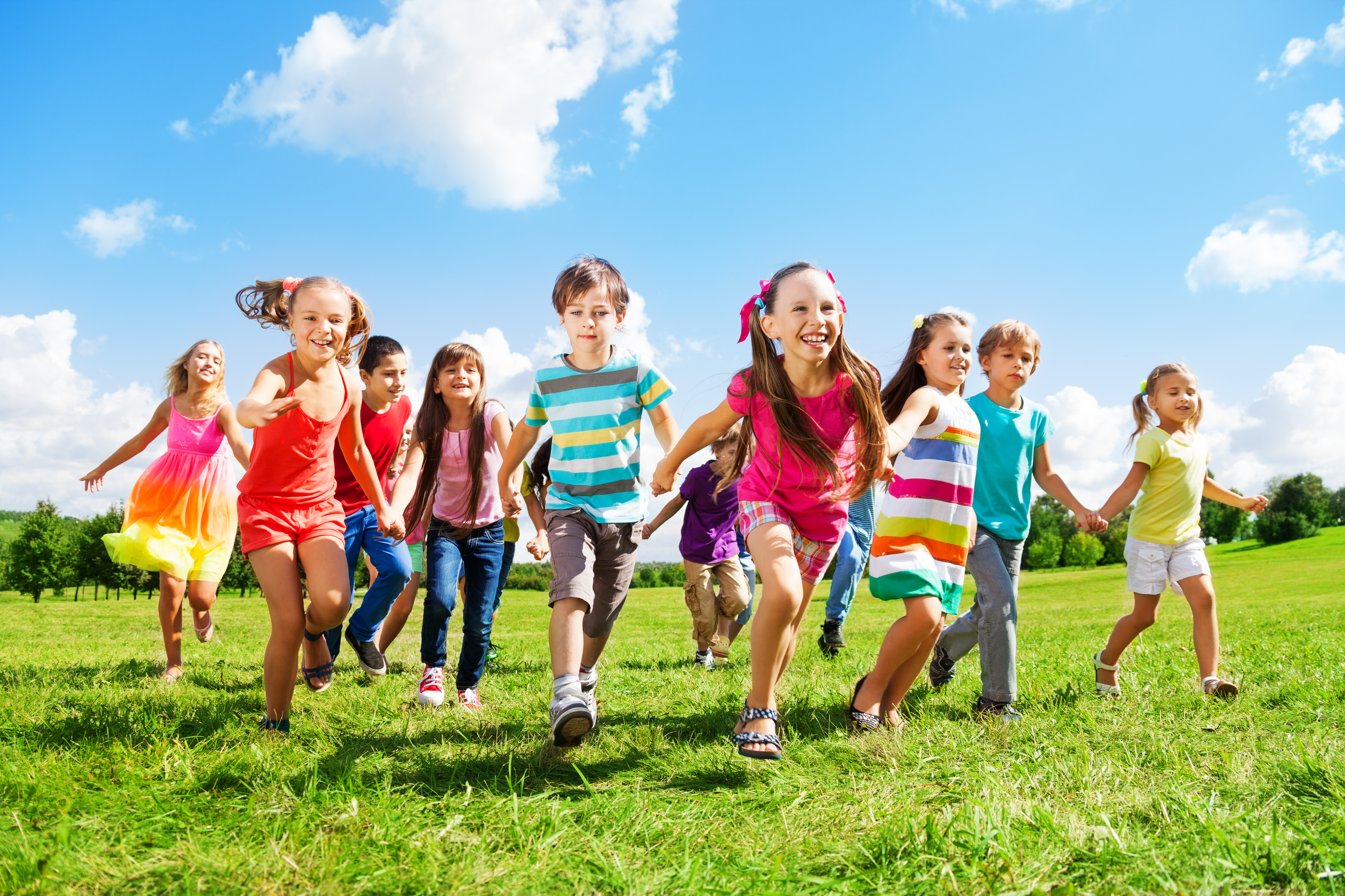Kids running enjoying summer