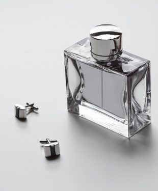 Horizontal mens cologne and cufflinks