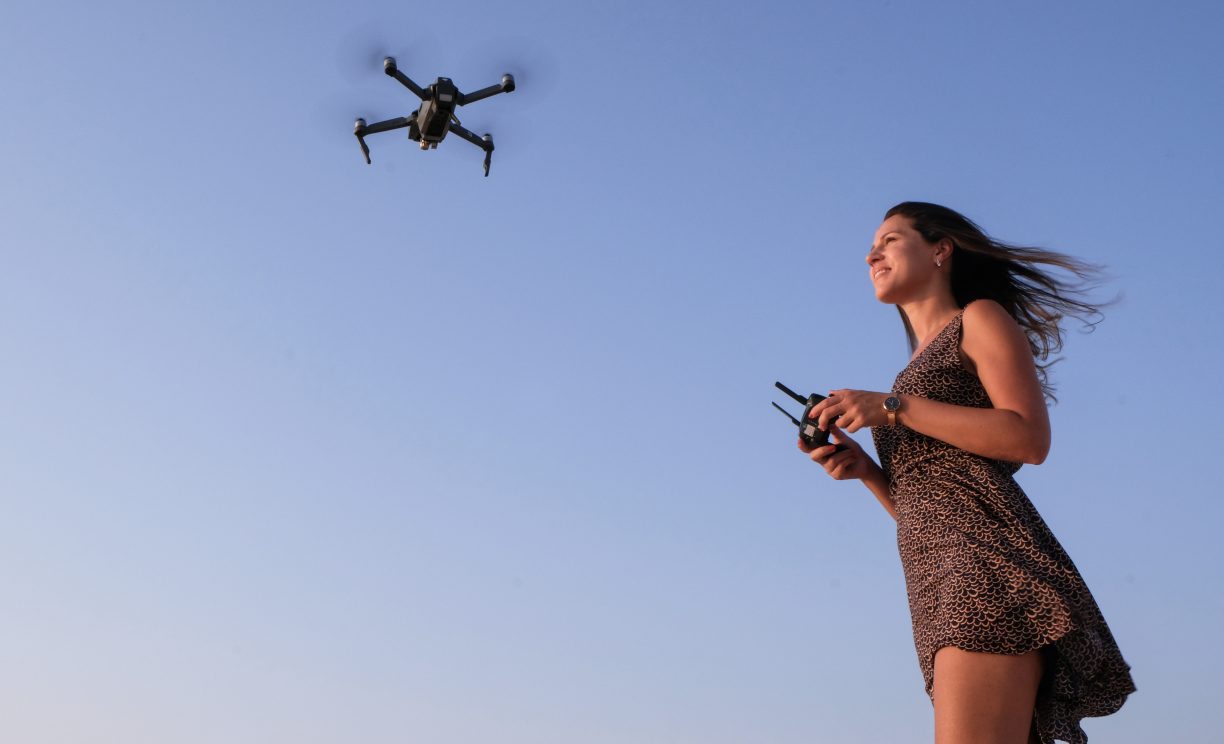 Woman playing drone