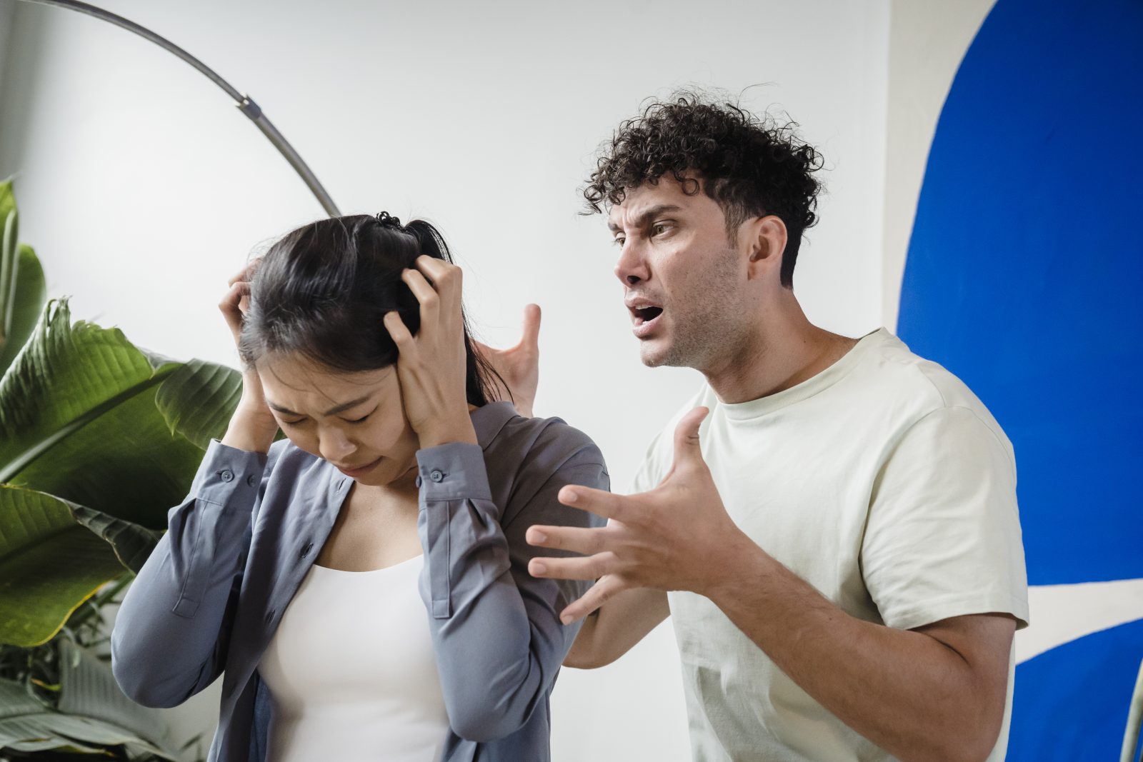 A man screaming on his partner