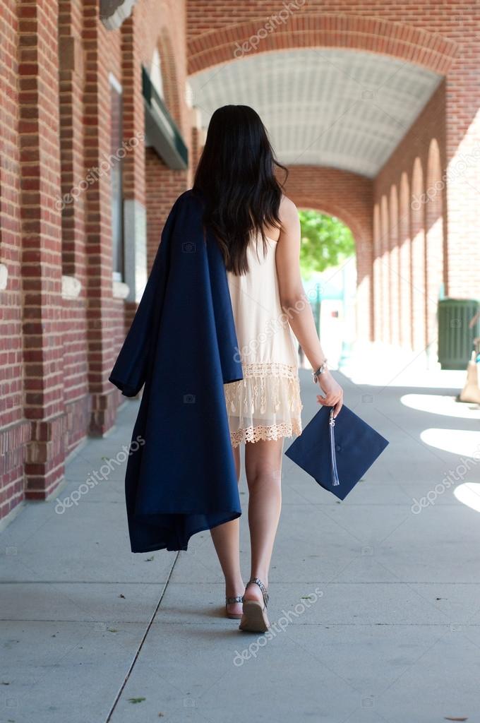 High school Graduate girl walking