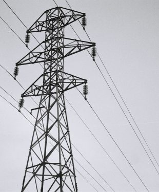 black electric tower under white sky