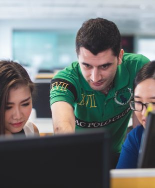 two women and one man on computer screen