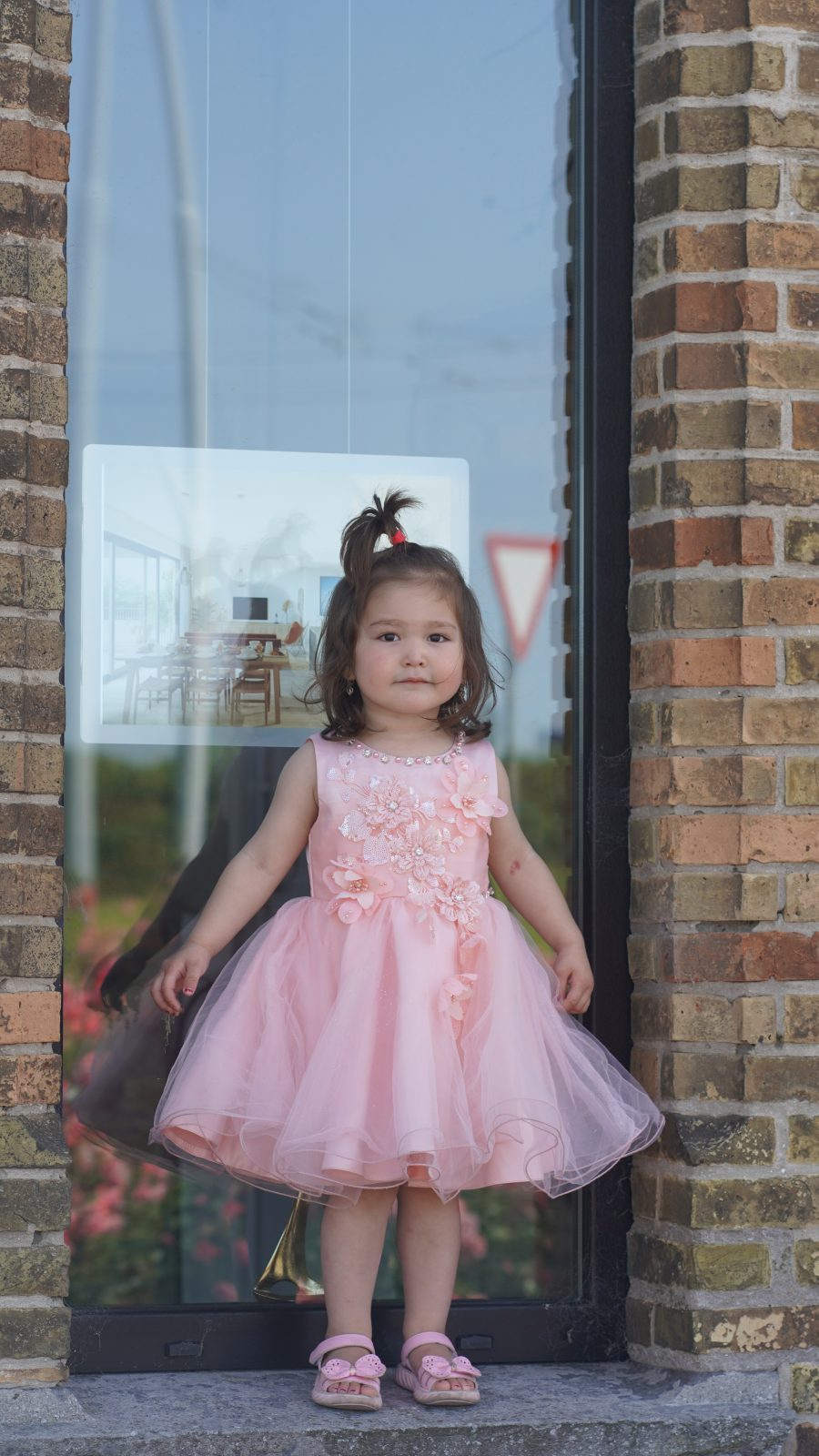 A pretty girl in pink dress