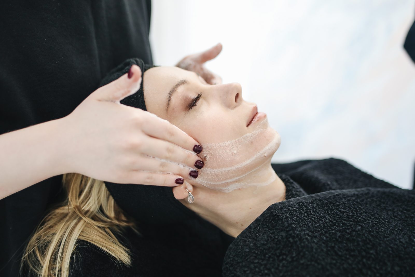 Woman having facial care