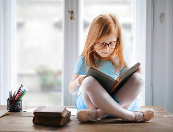 Photo of girl reading book