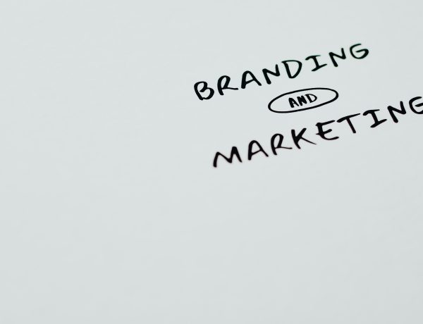 Branding and marketing text on a white surface