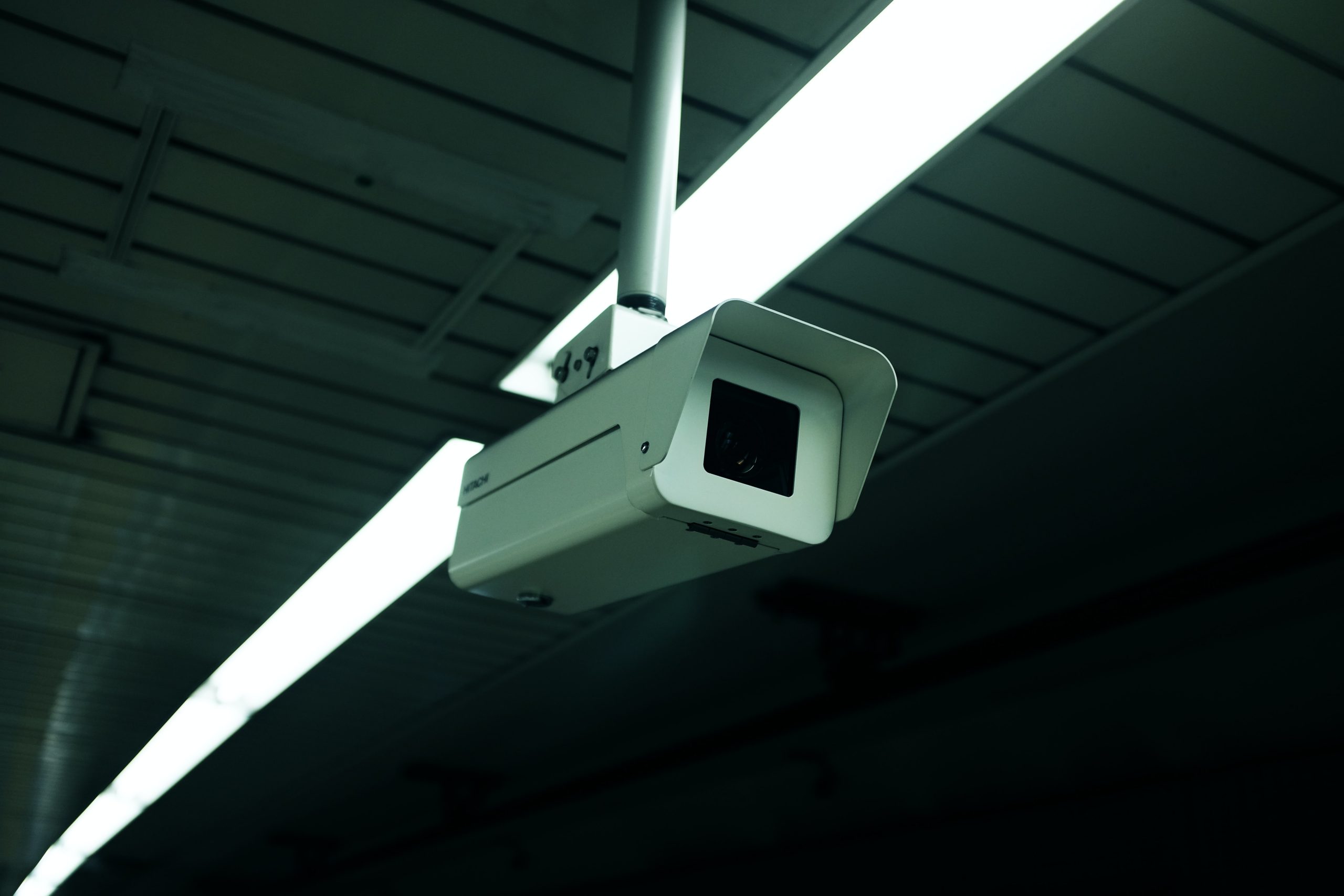 A white and black cctv camera