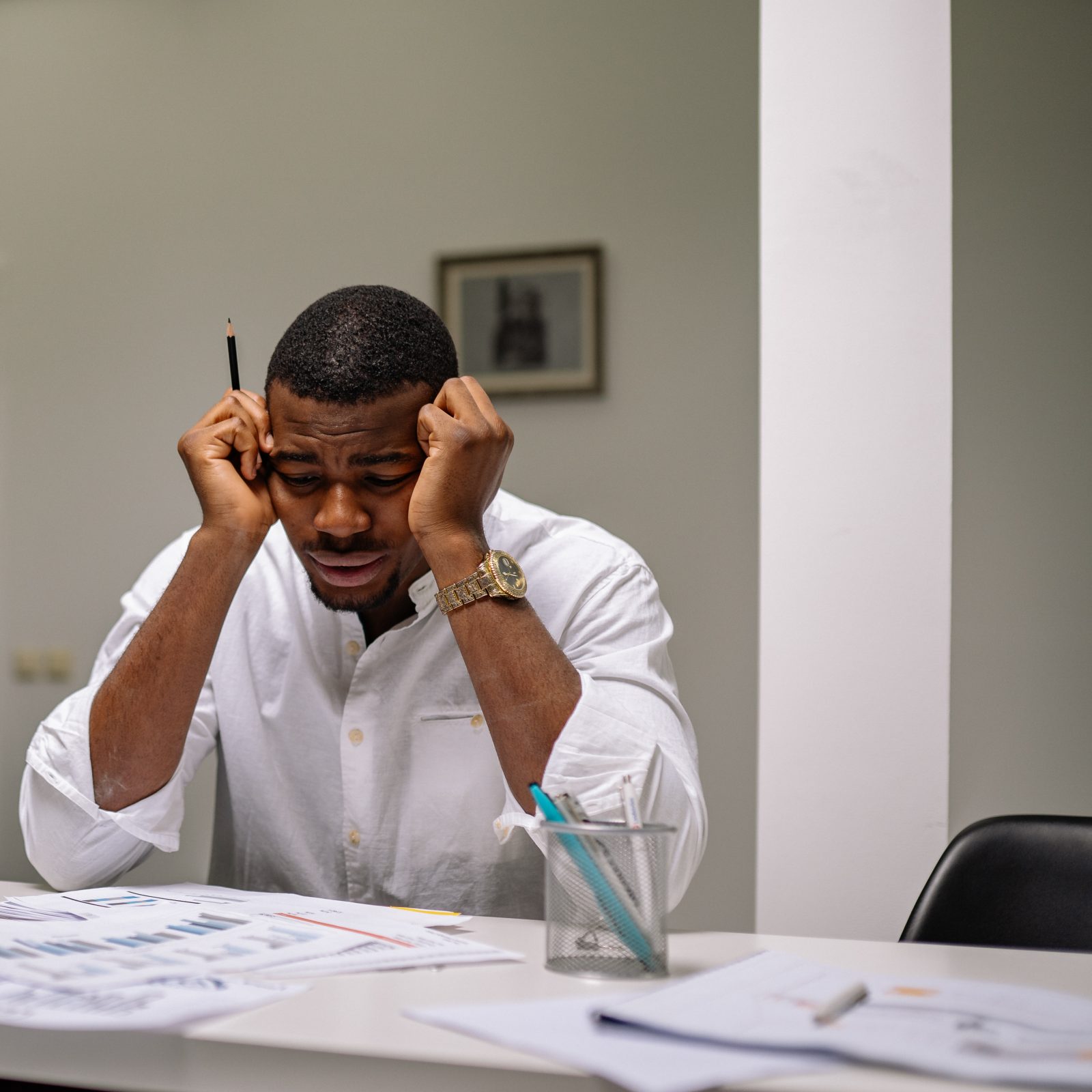 A stressed man at work