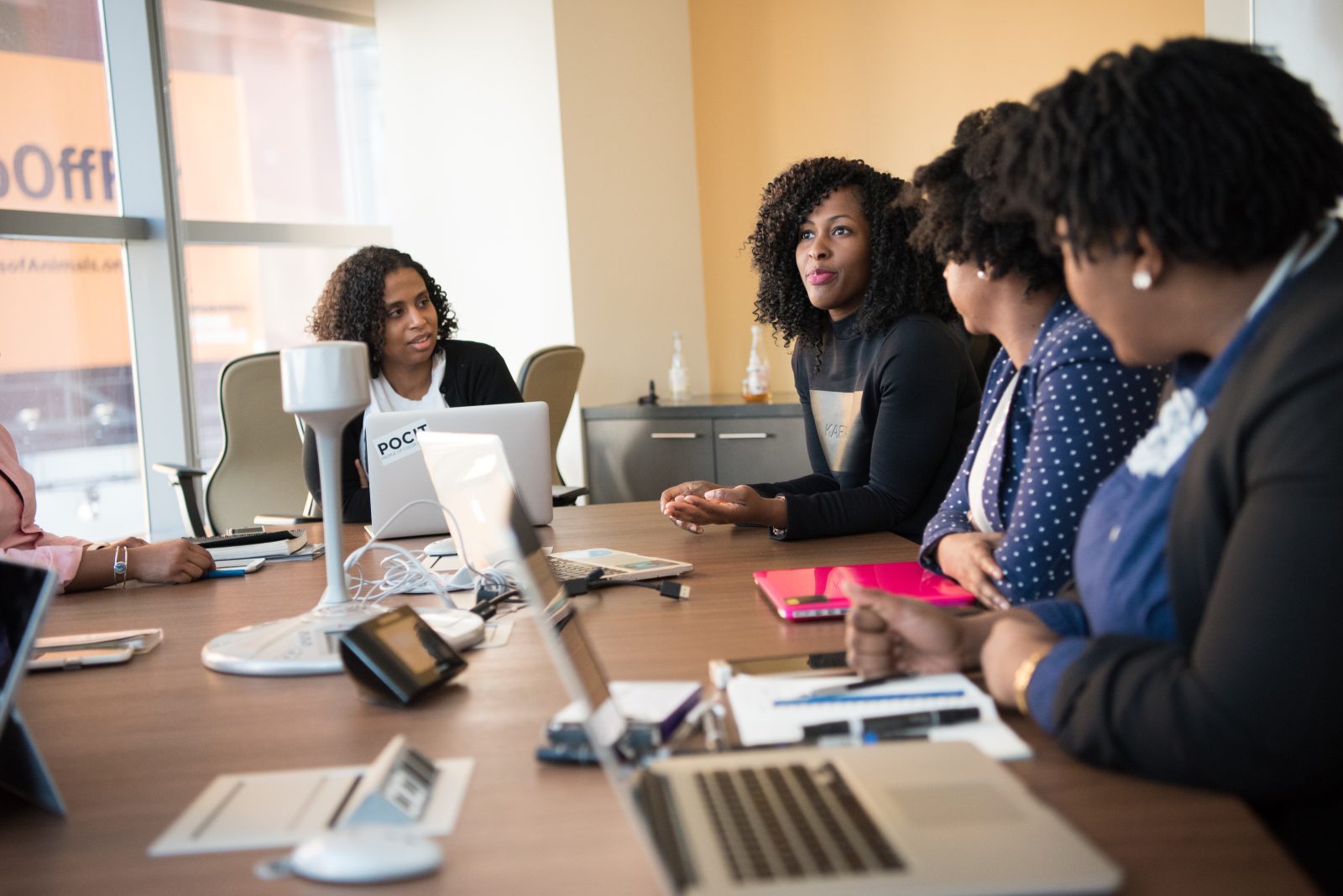 Employees gathered on a conference room