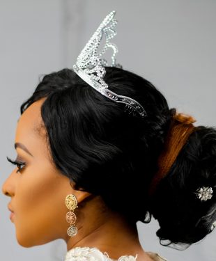 Woman wearing silver colored crown