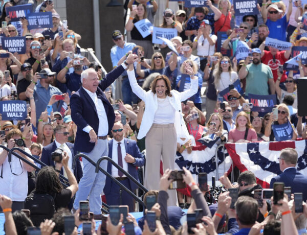 Kamala Harris and Tim Walz’s campaign tour poster looks like its for a concert. It’s by design.