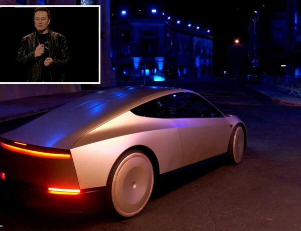 Elon Musk unveils surprise ‘robovan’ at flashy Tesla event, says Optimus humanoid robots will cost less than a car